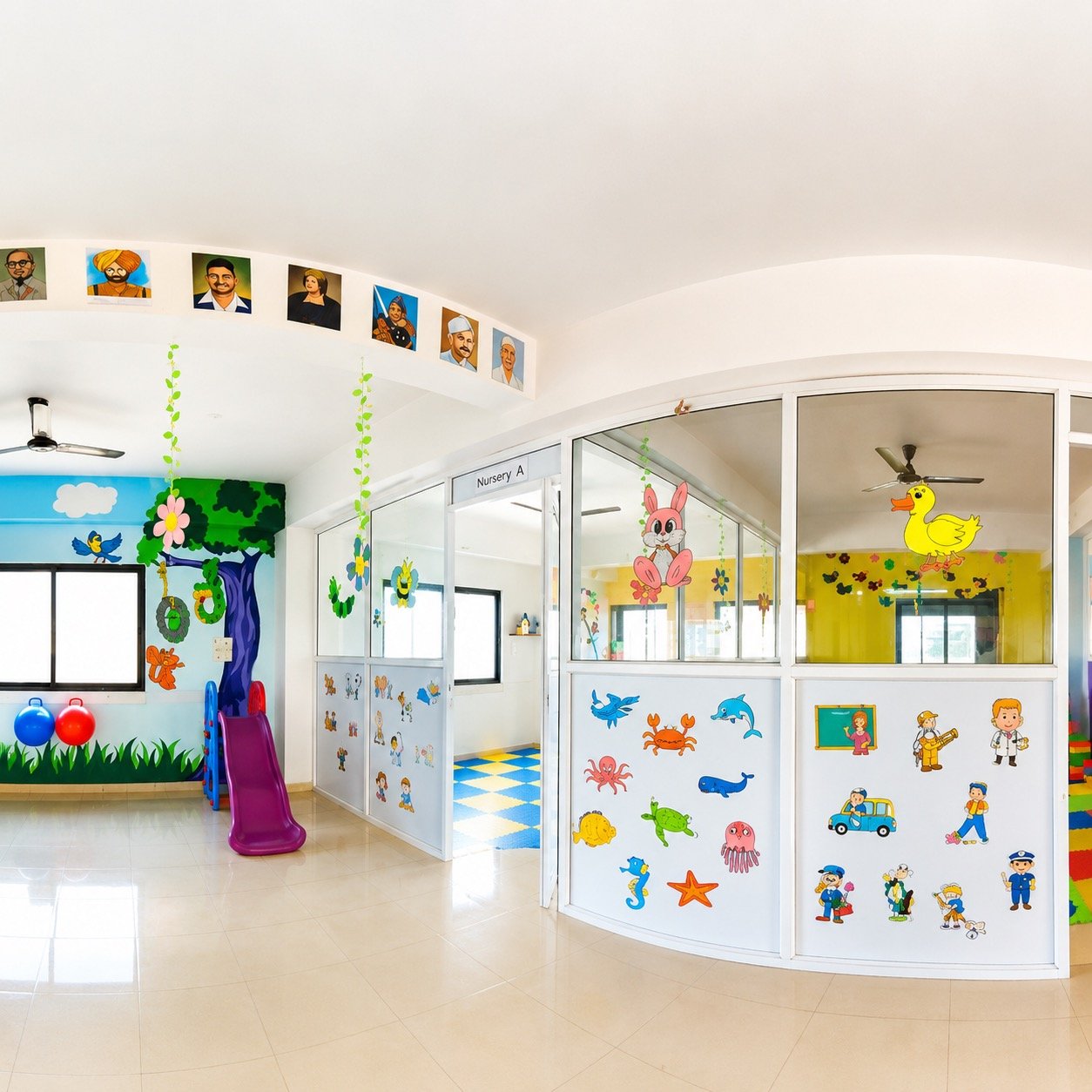 Classroom corridor with staff photo display and play corner